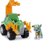 PAW PATROL Juguete de dinosaurio misterioso de Paw Patrol, Dino Rescue Rocky's Deluxe Rev Up